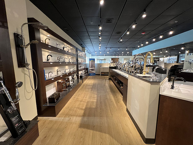 McDonald Plumning Supply showroom interior showing toilets and bathroom fixtures